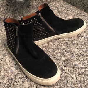 studded black sneakers